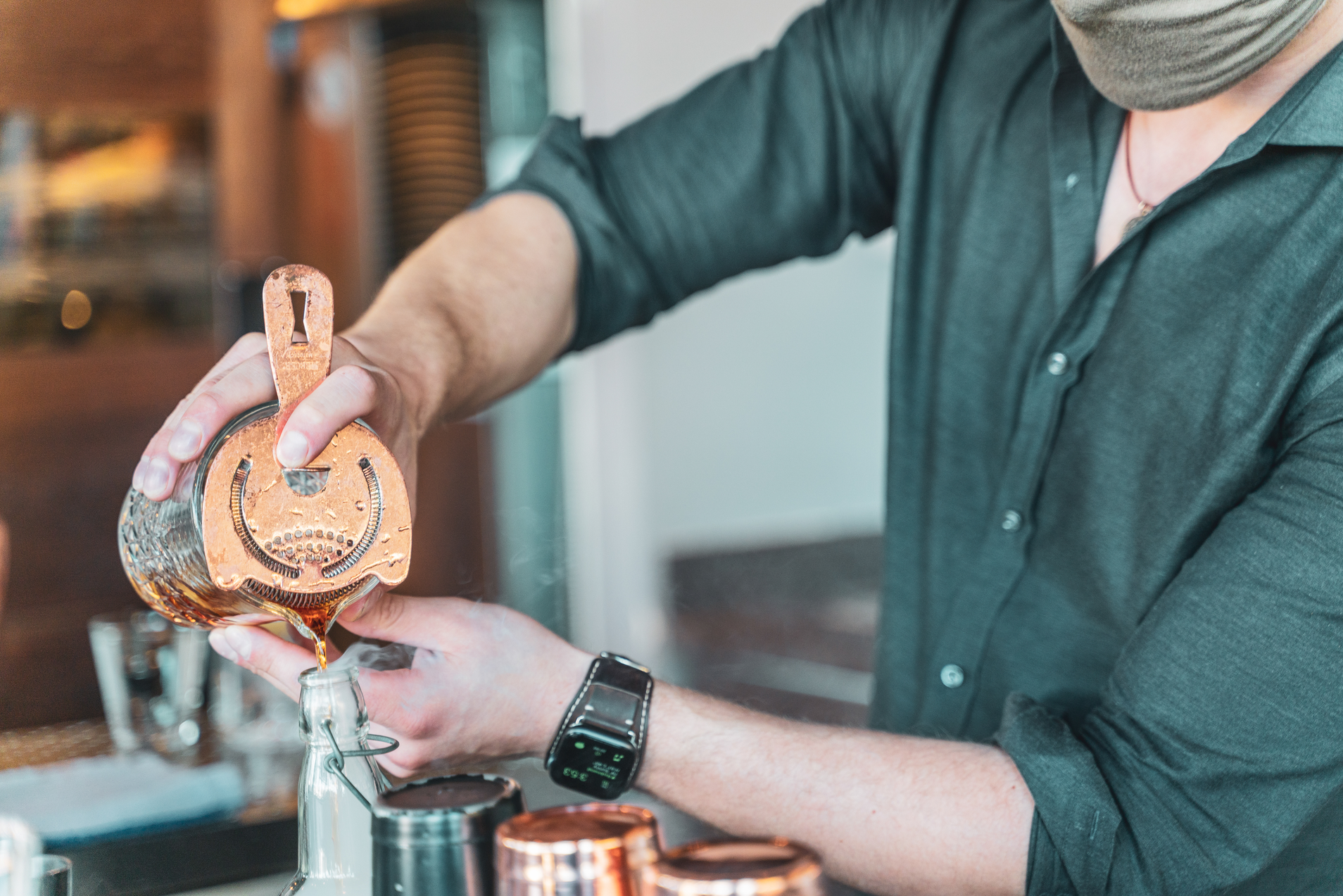 Man pouring cocktail